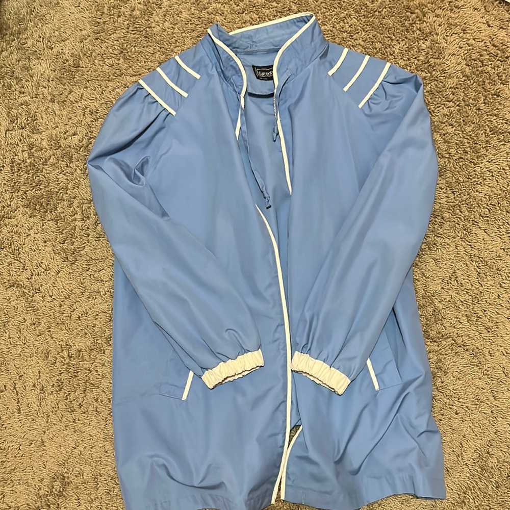 current seen blue windbreaker coat